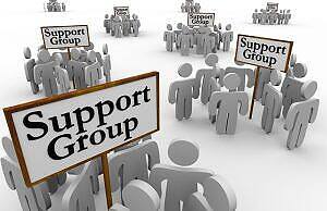 Illustration of multiple support groups with figures gathered around signs reading 'Support Group', representing the community aspect of 12 Step Programmes