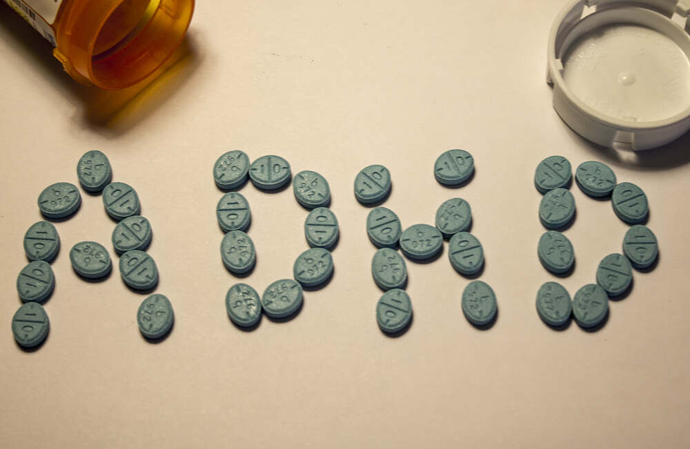 Adderall pills spelling out ADHD