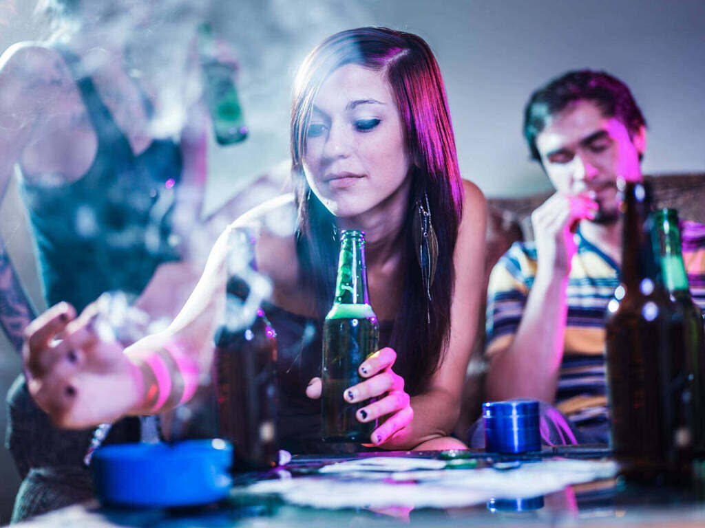 teenage girl drinking alcohol and smoking